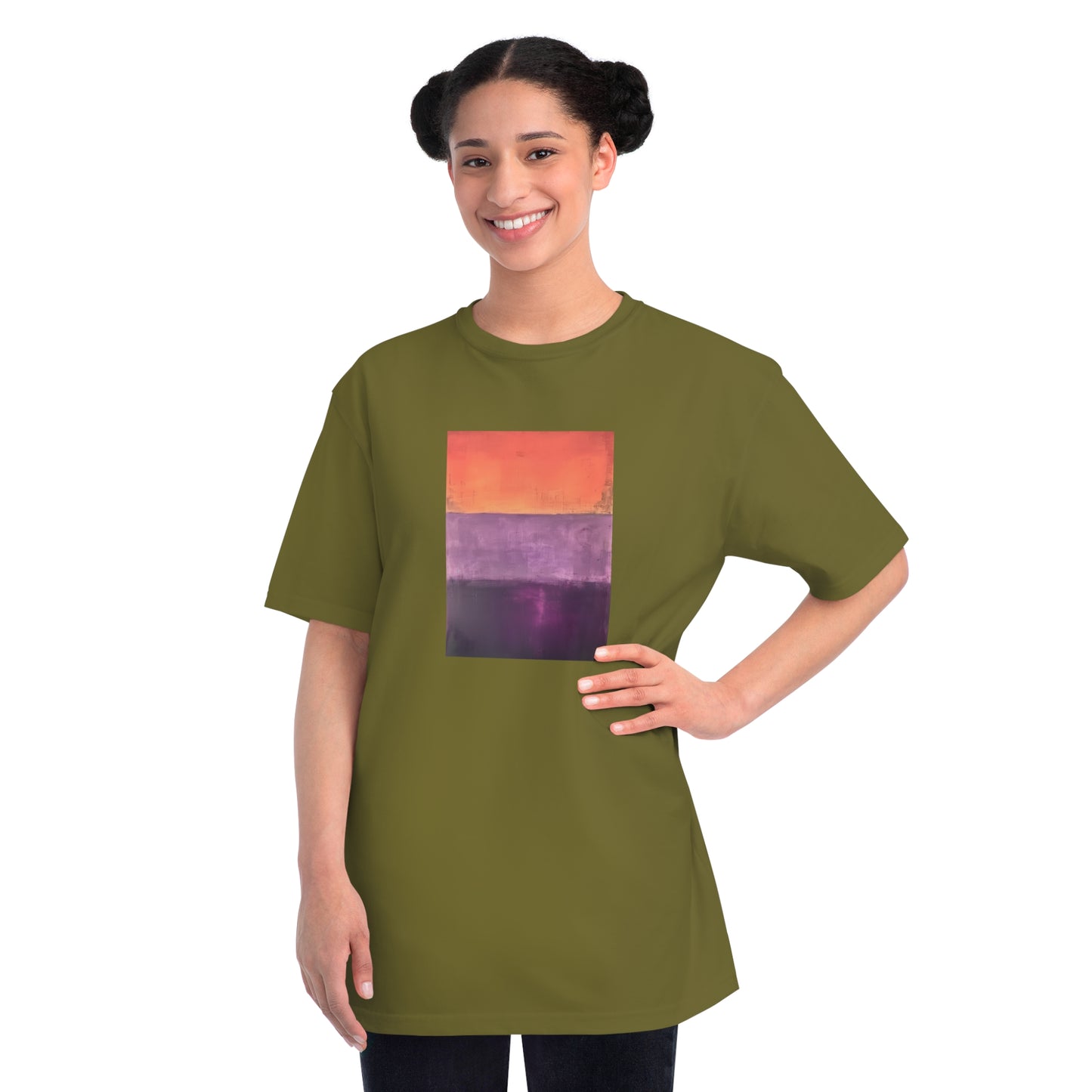 a woman wearing a t - shirt with a picture of a sunset