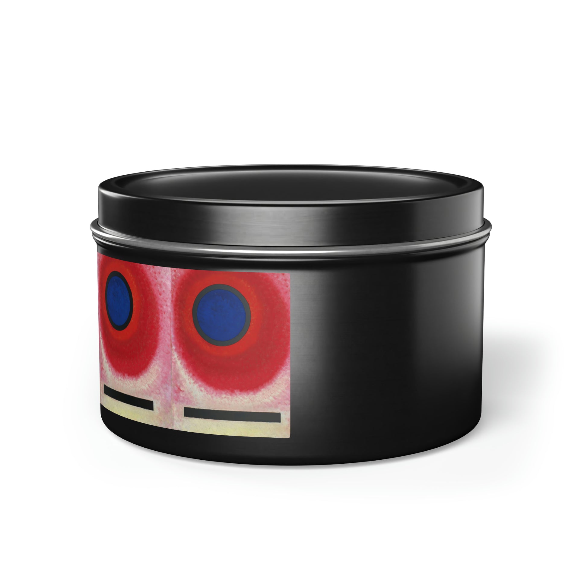 a black tin with a red and blue design on it