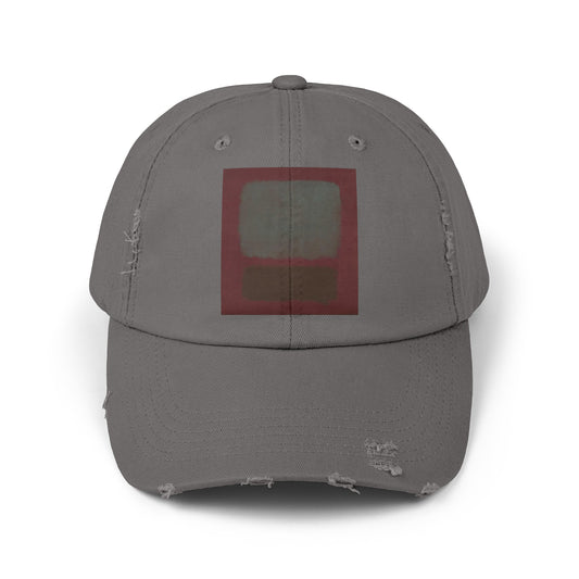 a gray hat with a red square on it