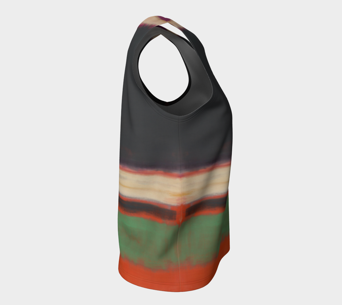 a multicolored bag hanging on a white wall