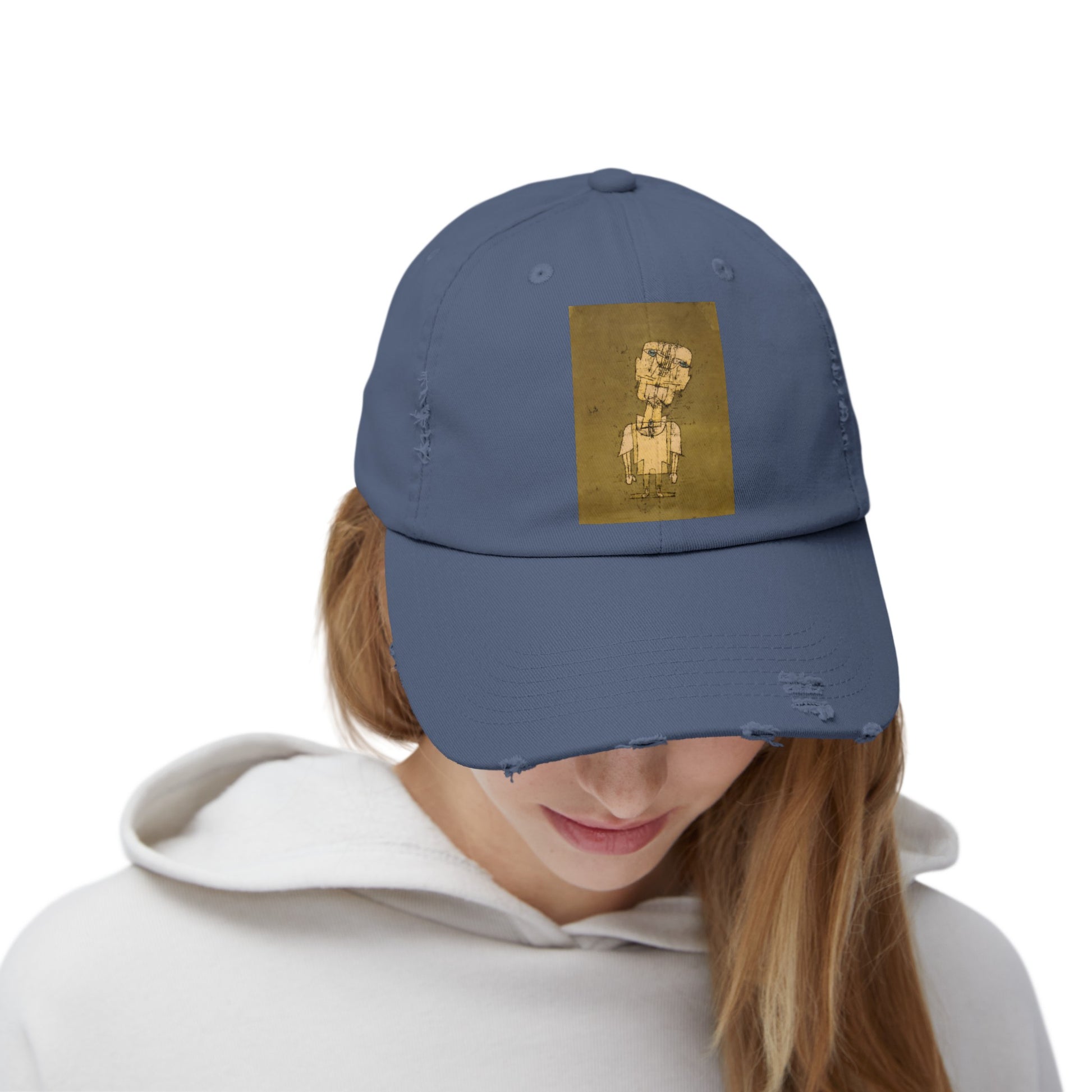 a woman wearing a blue hat with a picture of a man on it