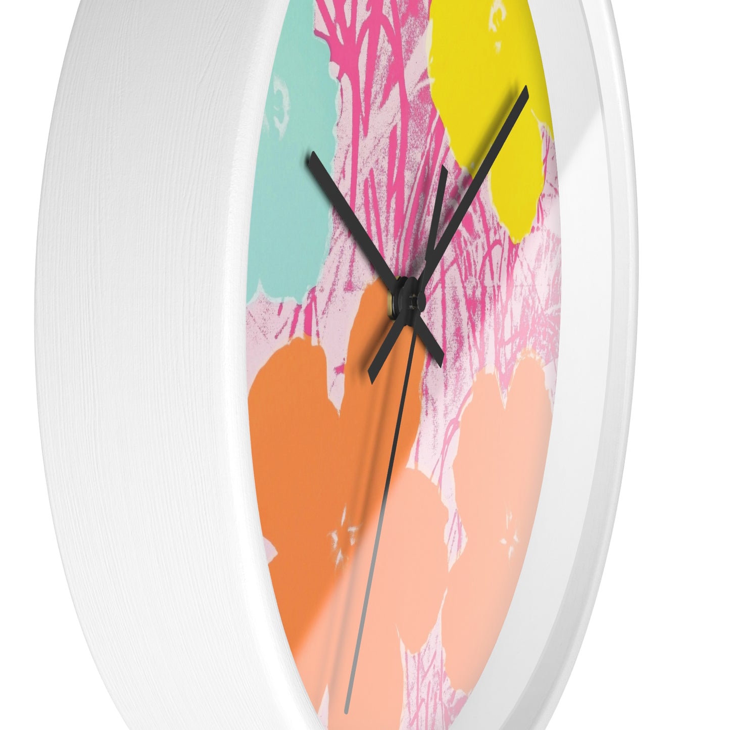 a white clock with a colorful design on it