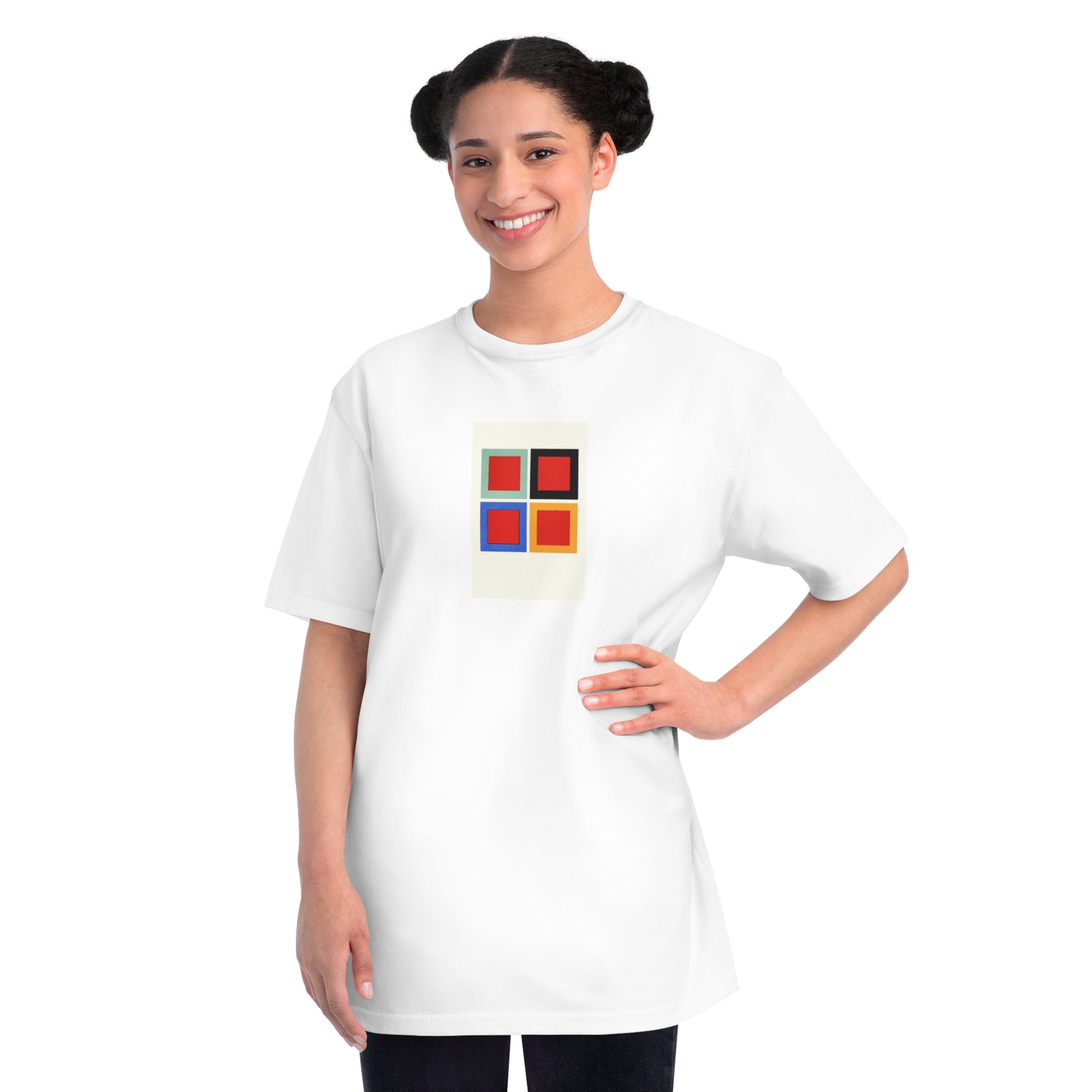 a woman wearing a white t - shirt with colorful squares on it