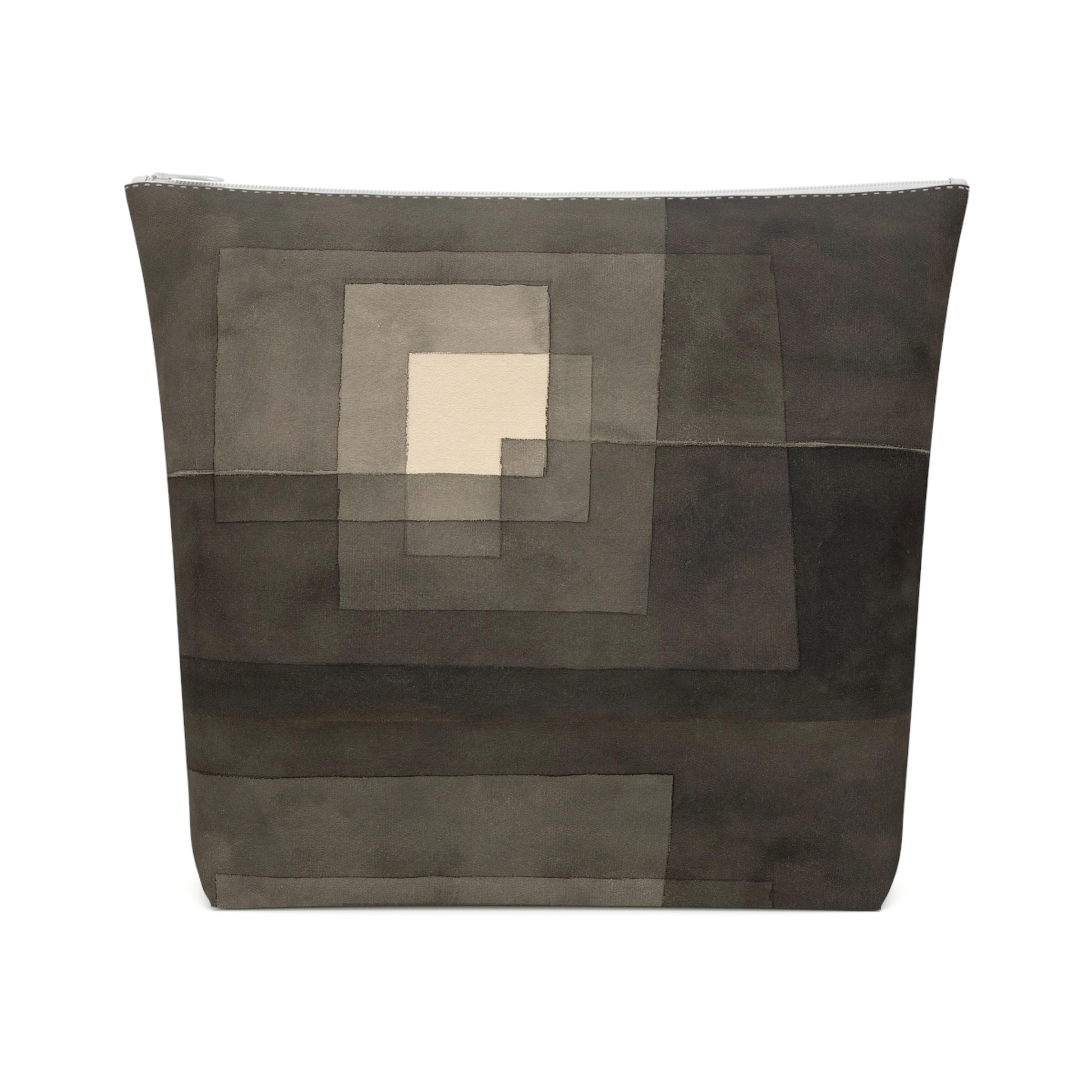 a black and white bag with a square pattern on it