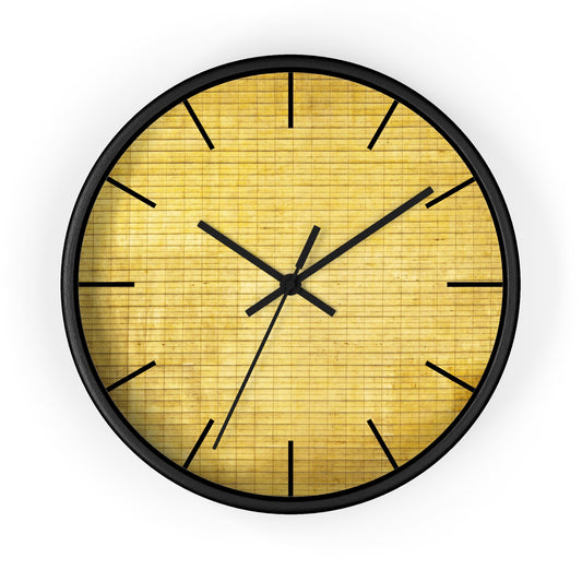 a black and gold clock on a white background