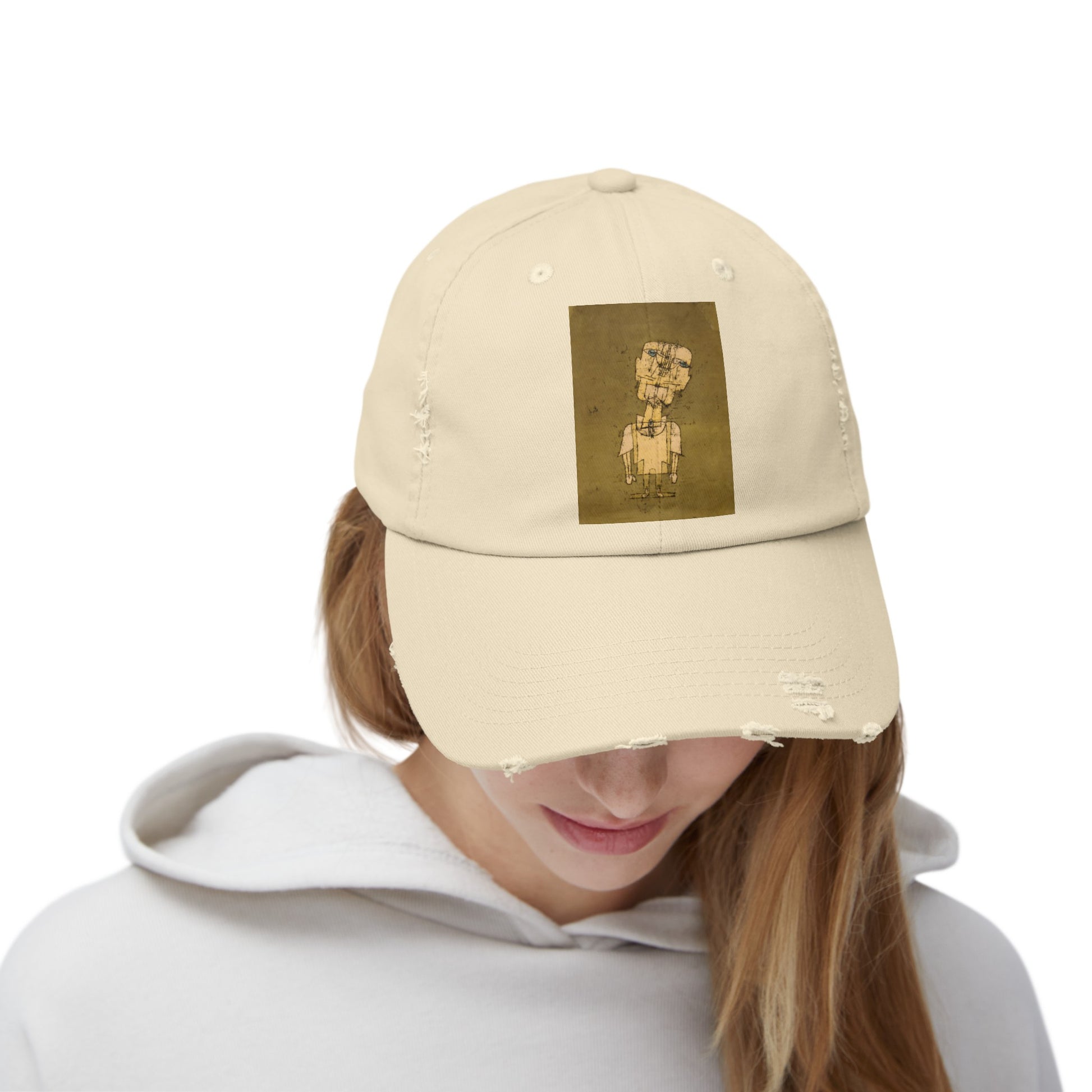 a woman wearing a hat with a picture of a man on it
