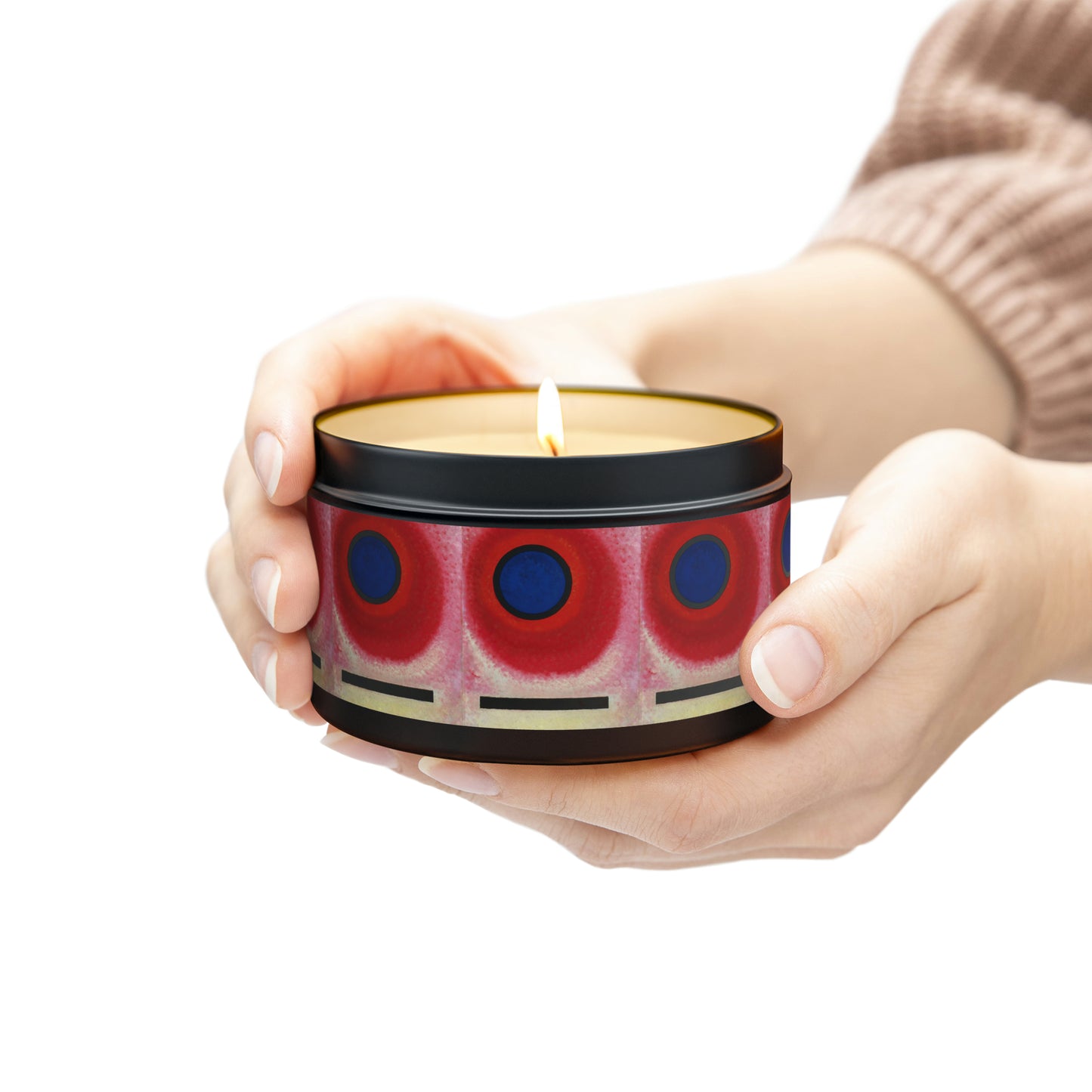 a woman holding a candle in her hands