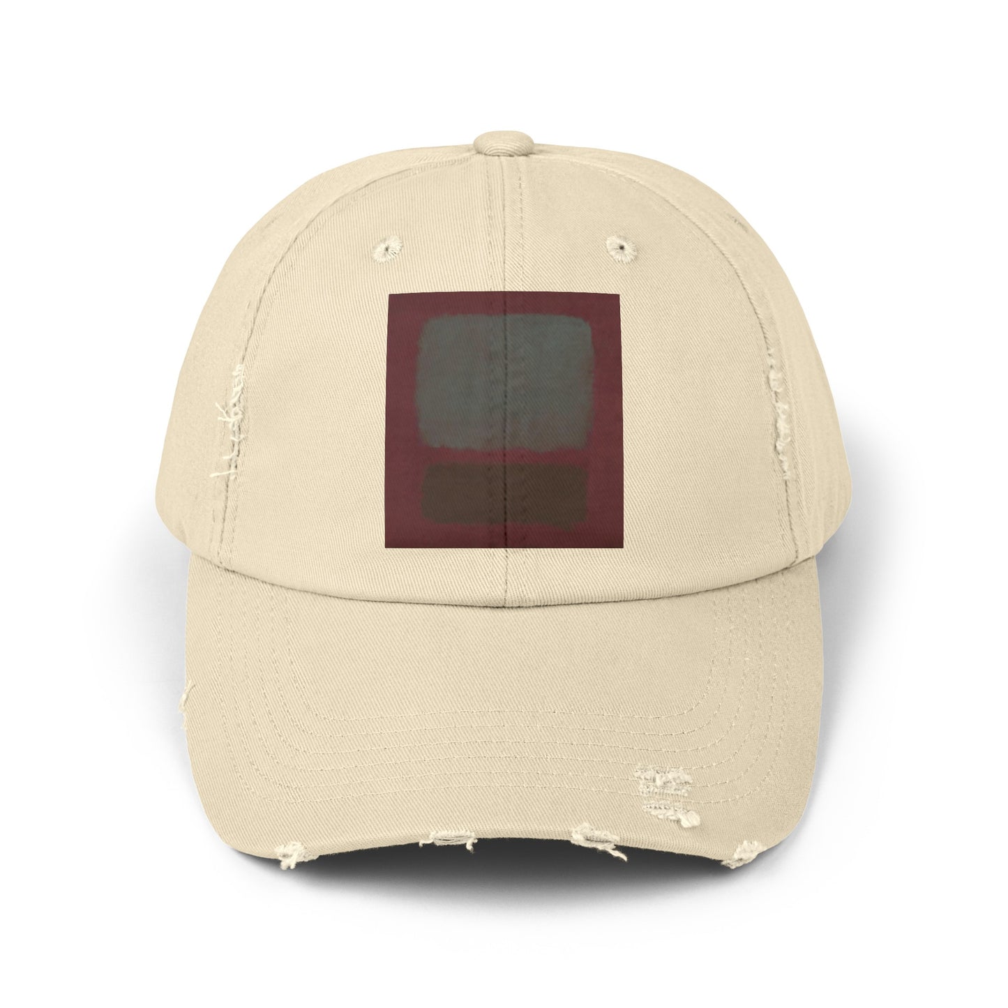 a white hat with a red square on it