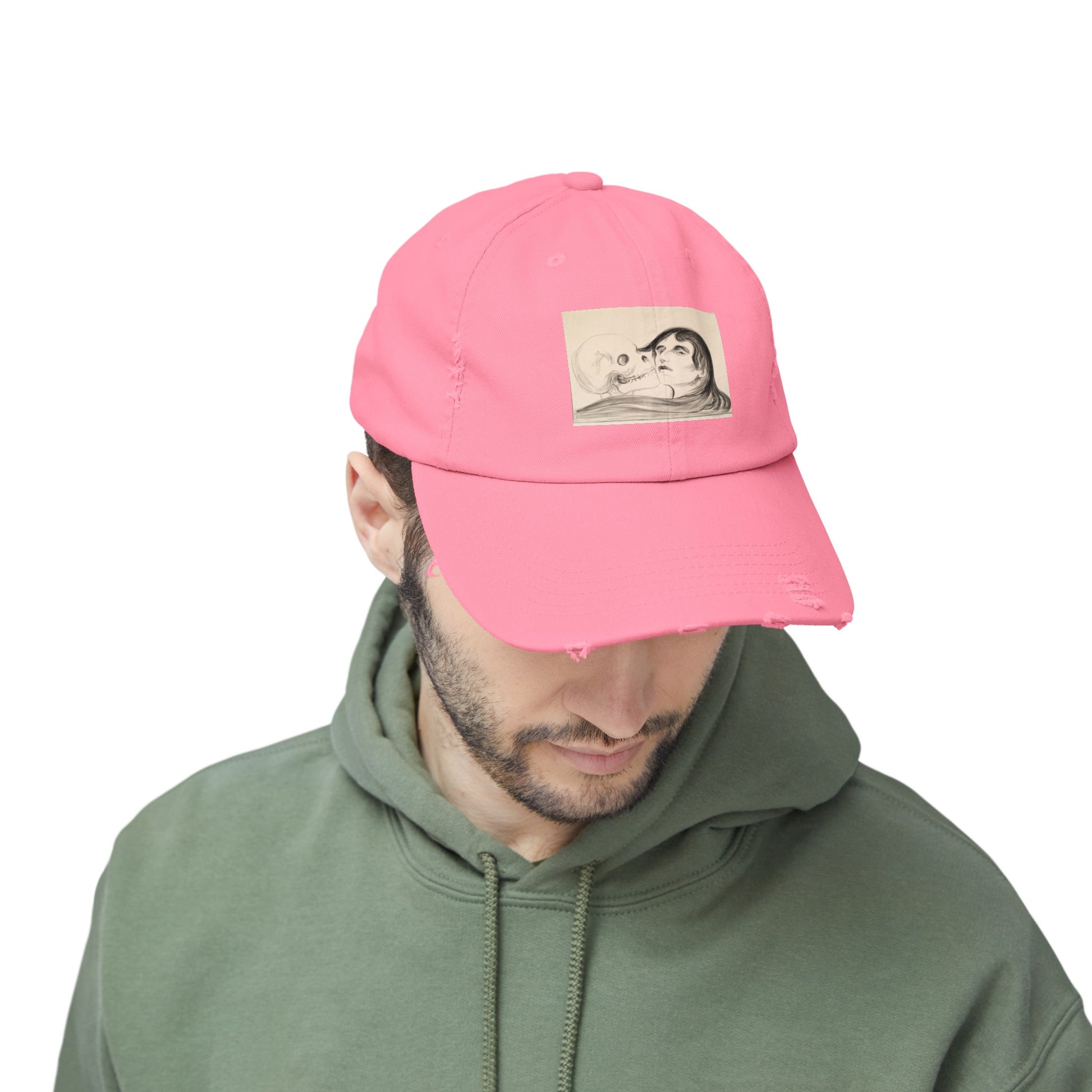 a man wearing a pink hat with a picture of a cat on it