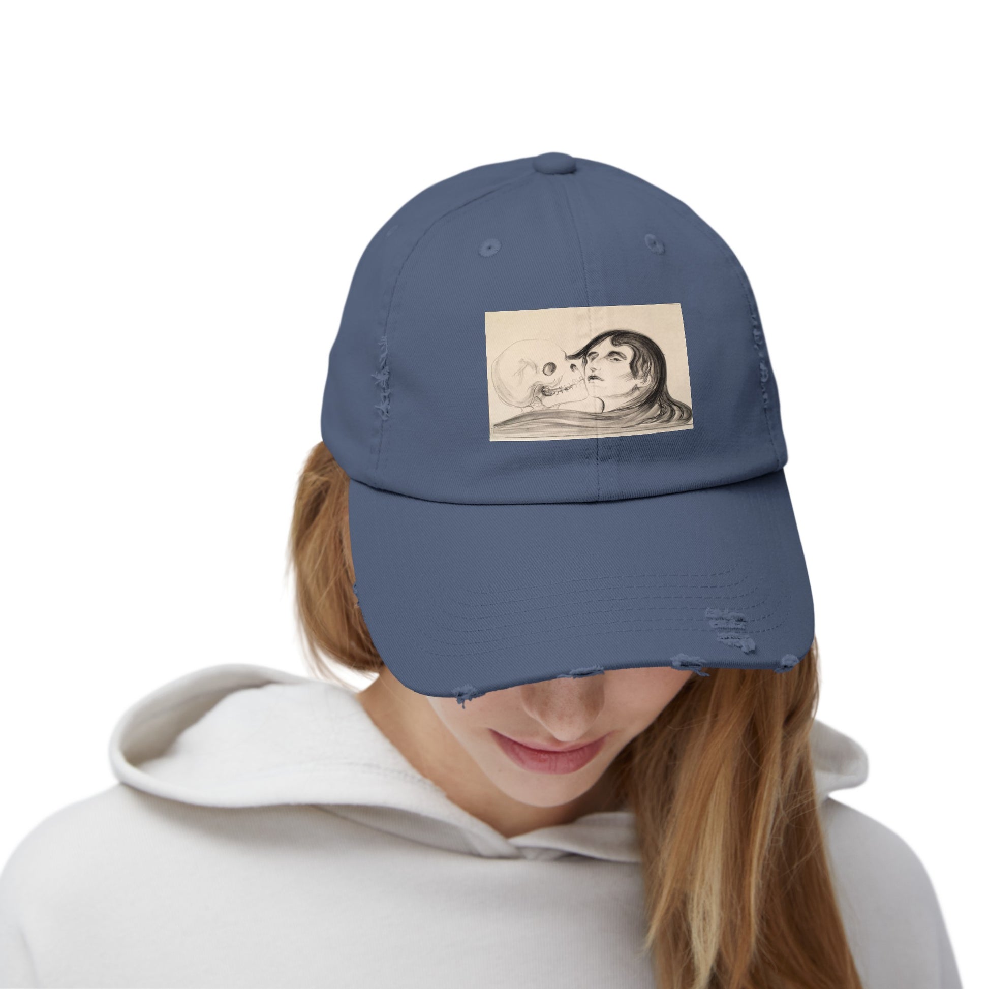 a woman wearing a blue hat with a picture of a man and woman on it