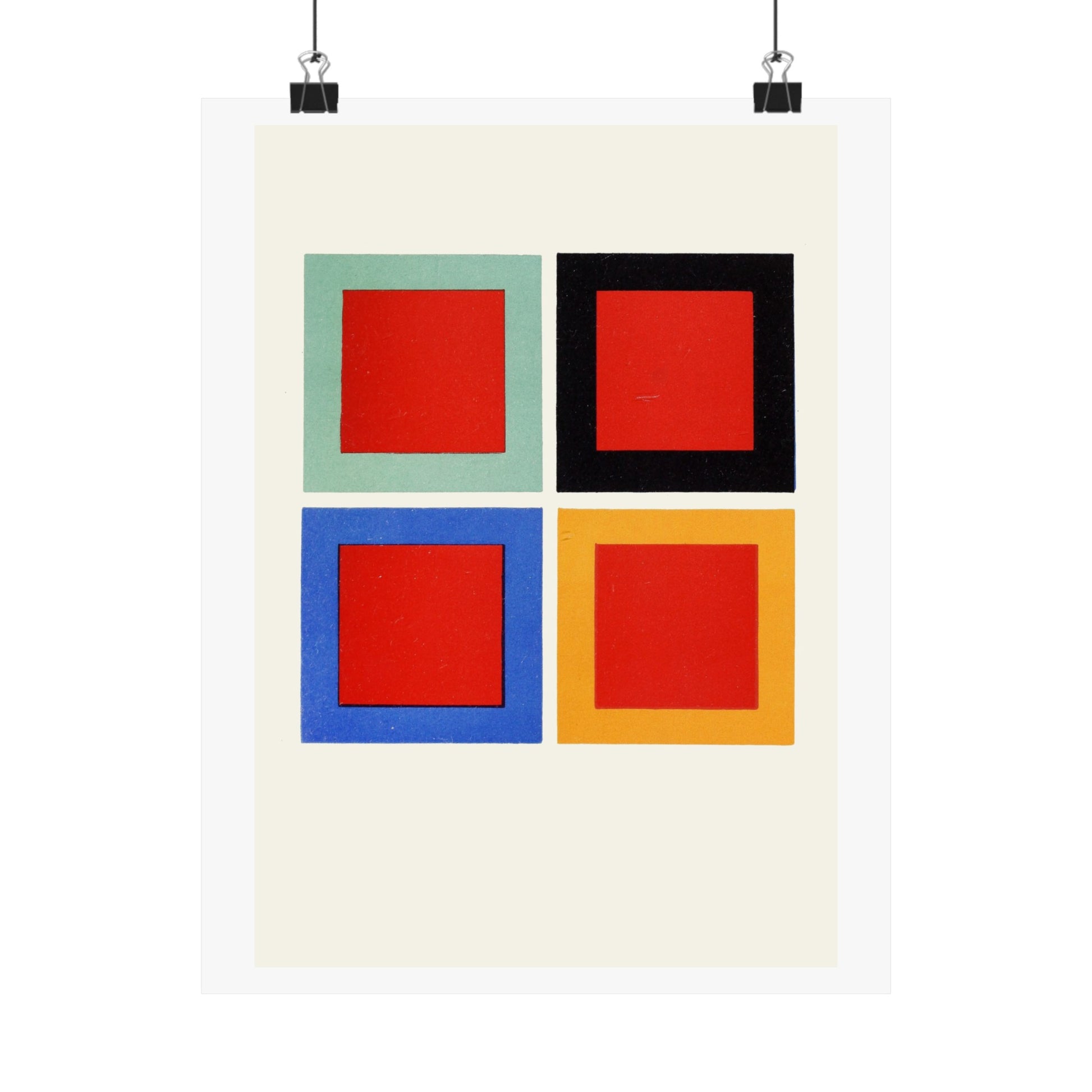 a white poster with four squares in different colors