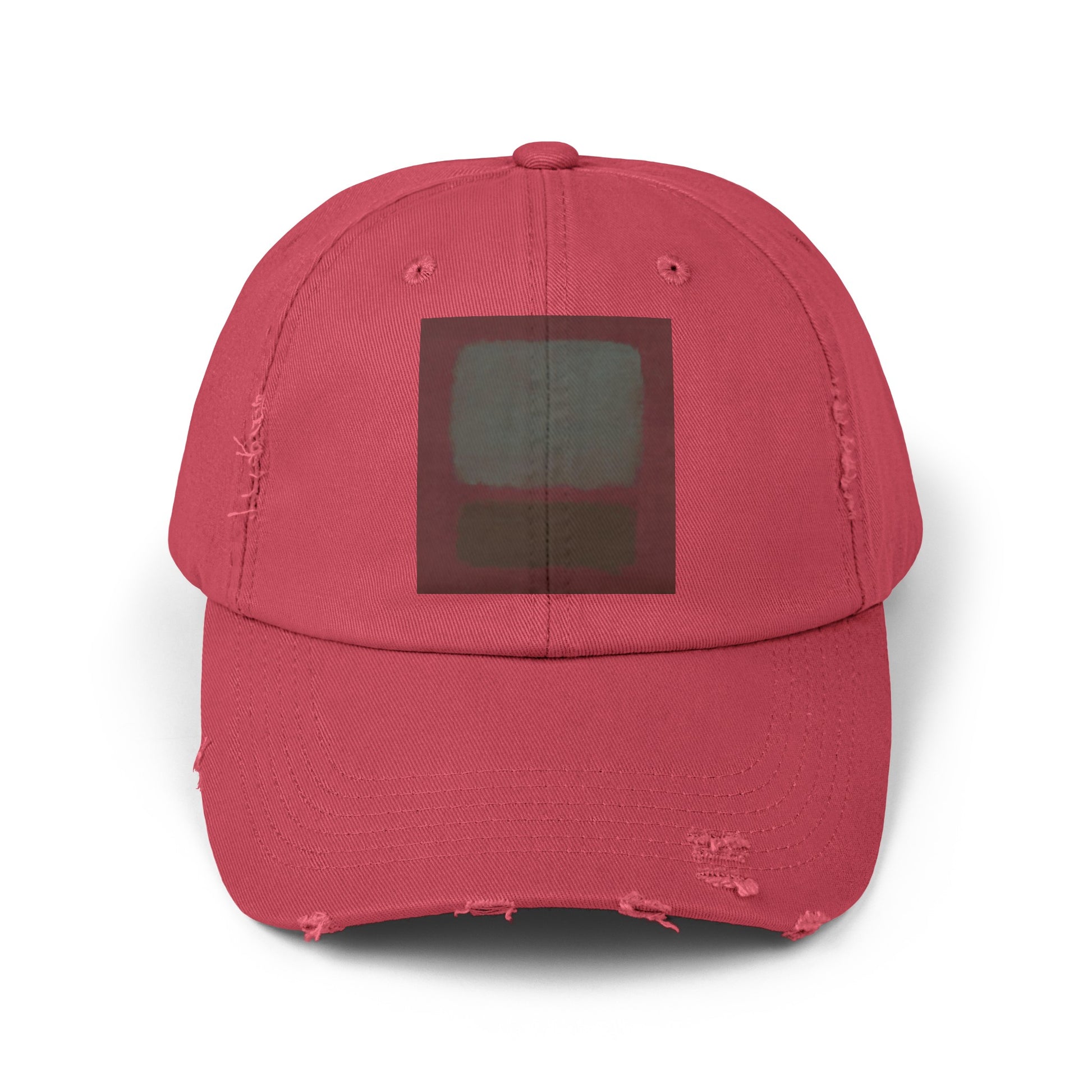 a red hat with a black square on it