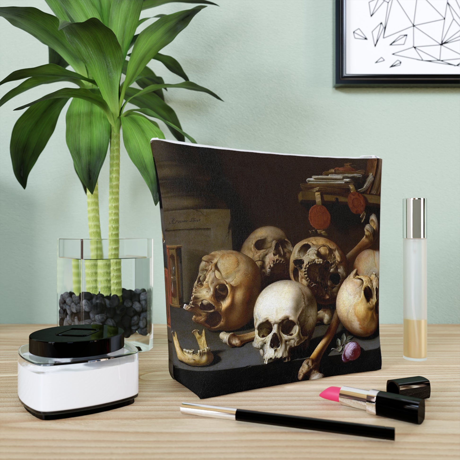 a painting of skulls and a plant on a table