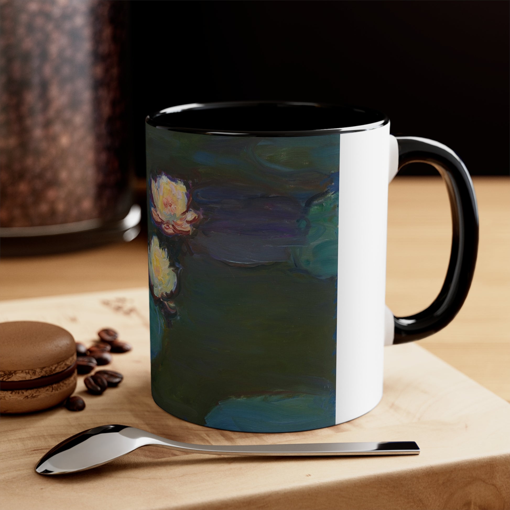 a coffee mug with a painting of water lillies on it