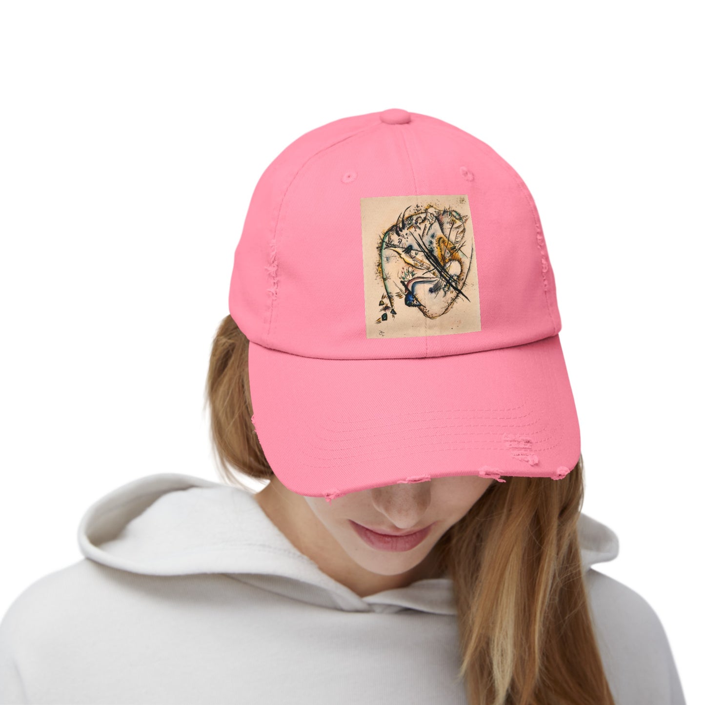 a woman wearing a pink hat with a dragon on it