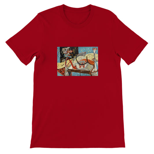 a red t - shirt with a picture of a man riding a horse