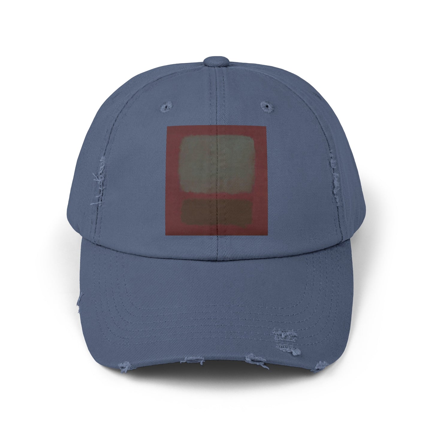 a blue hat with a red square on it