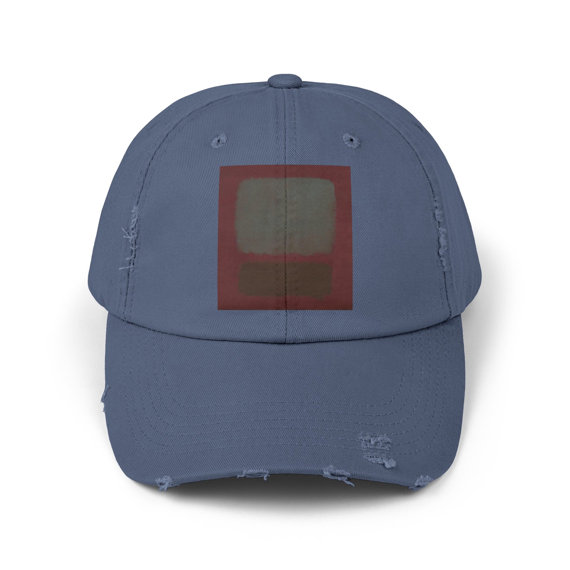 a blue hat with a red square on it