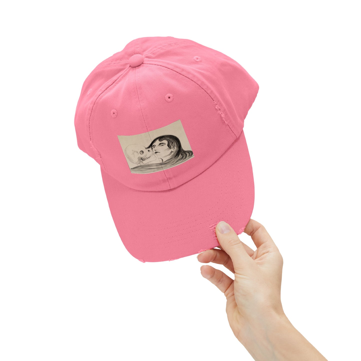 a pink hat with a picture of a woman's face on it