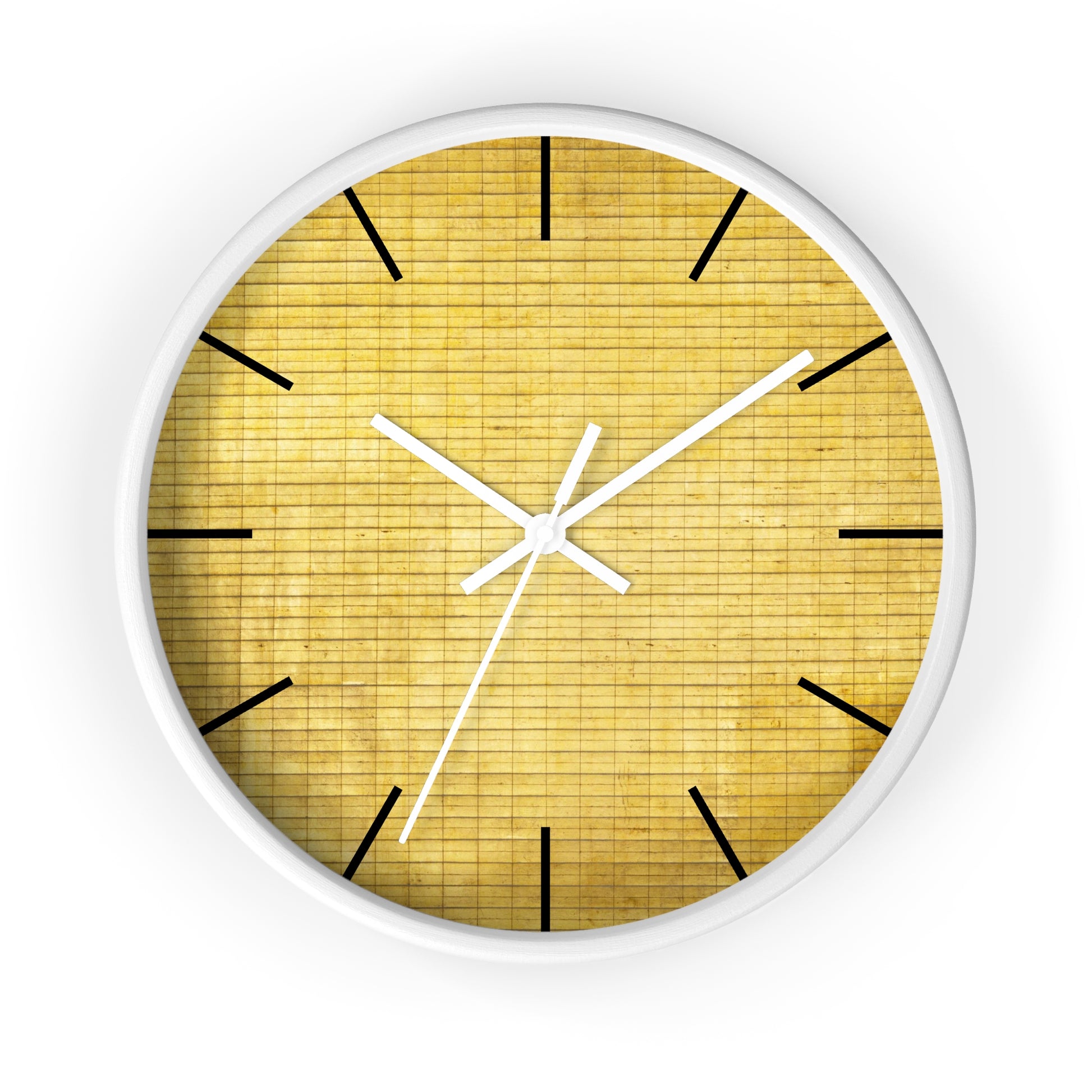 a white clock with a yellow face on a white background