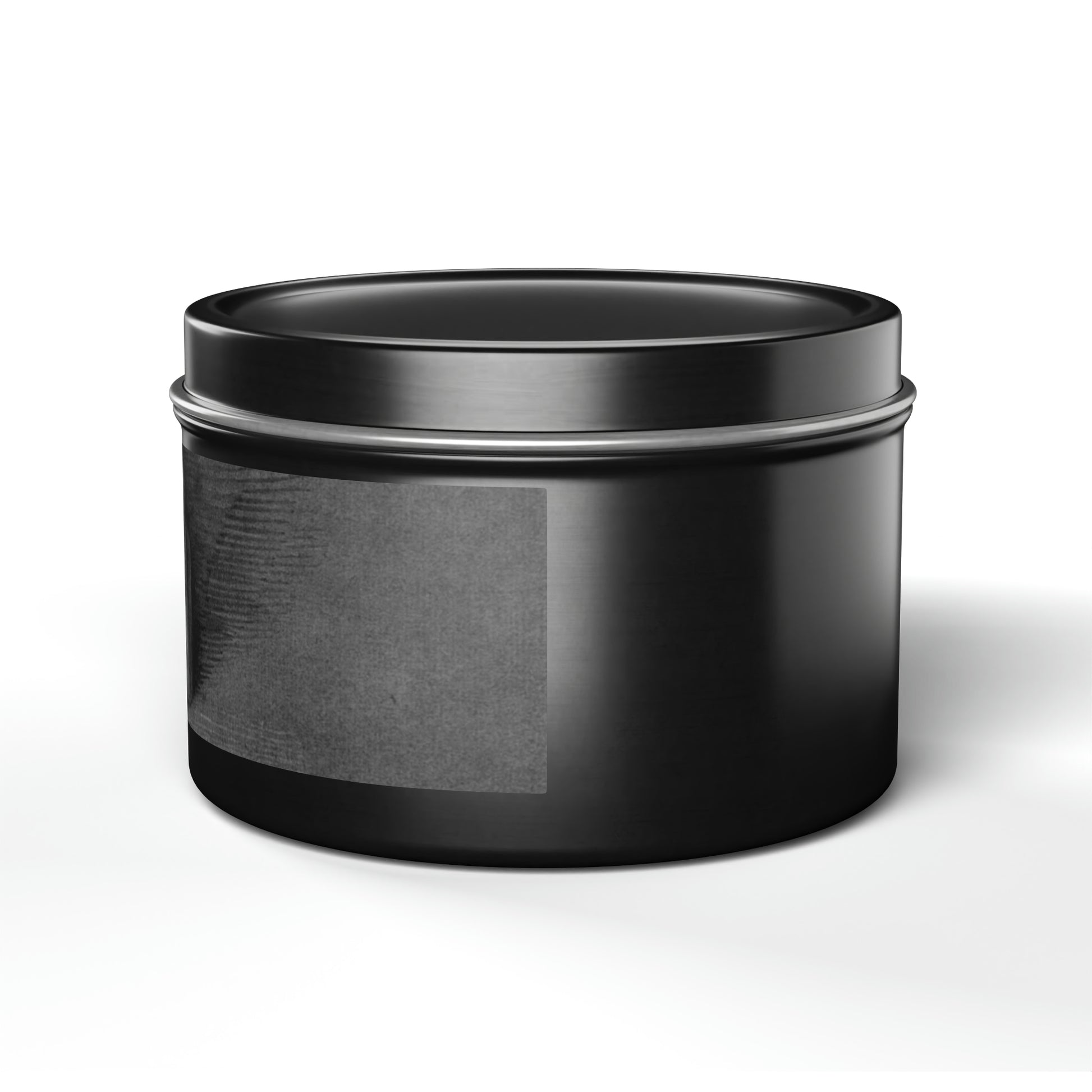 a black container is sitting on a white surface