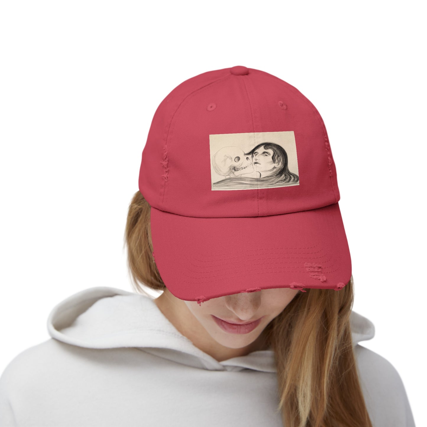 a woman wearing a red hat with a picture of a man and woman on it