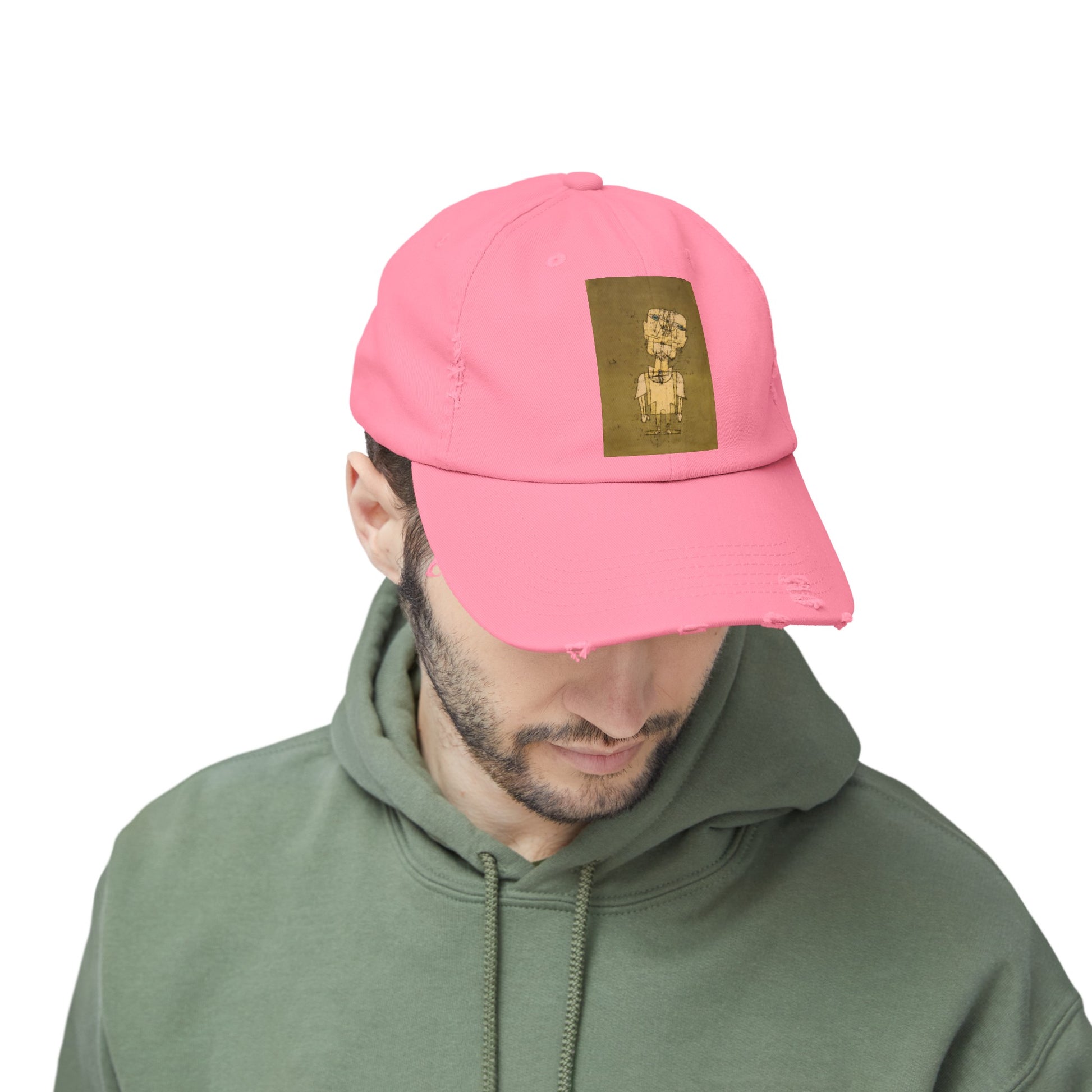 a man wearing a pink hat and a green hoodie