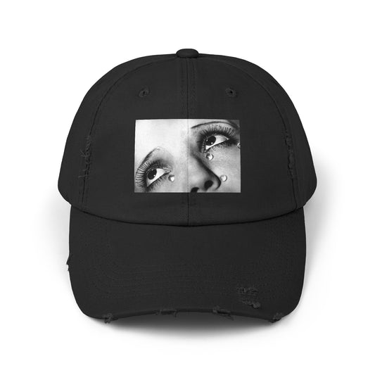 a black hat with a picture of a woman's face
