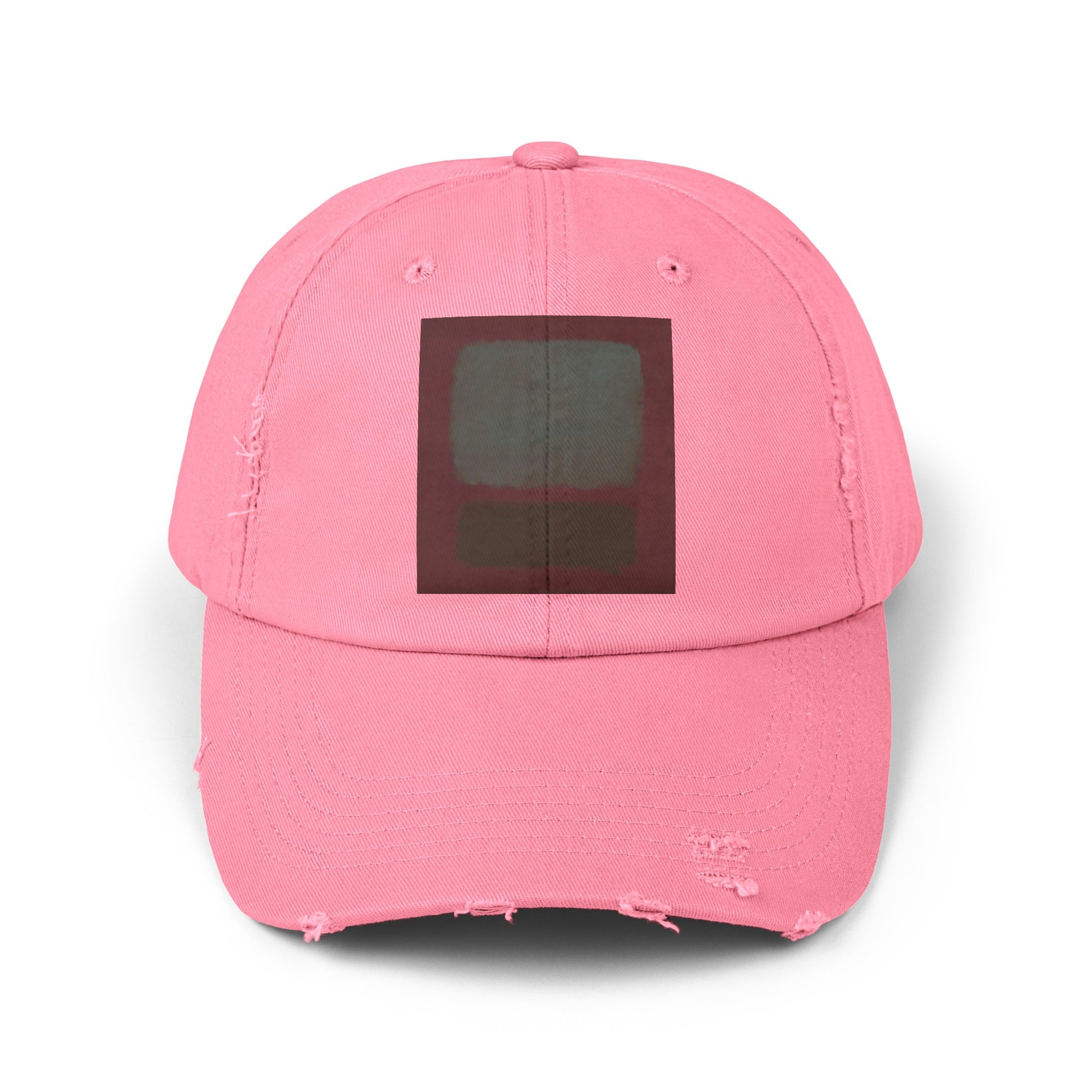 a pink hat with a black square on it