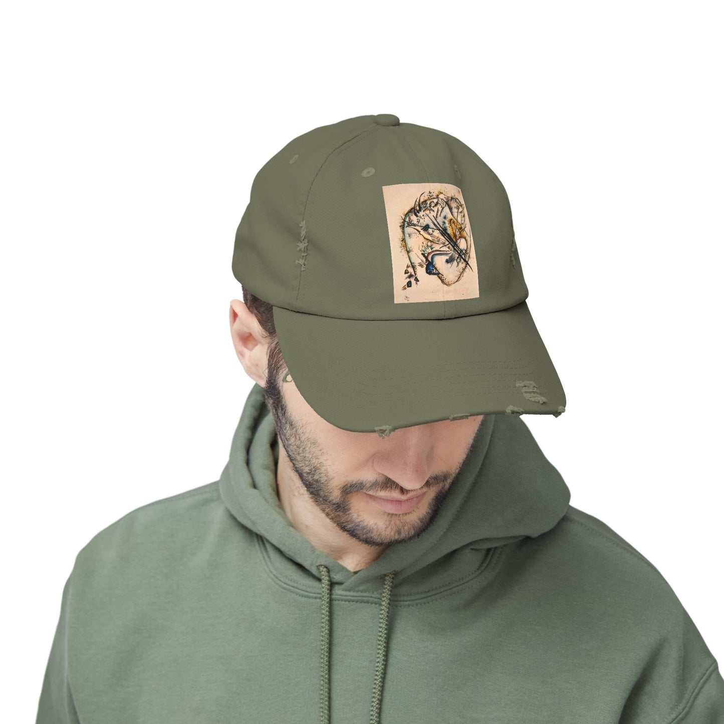 a man wearing a green hat with a picture of a tiger on it