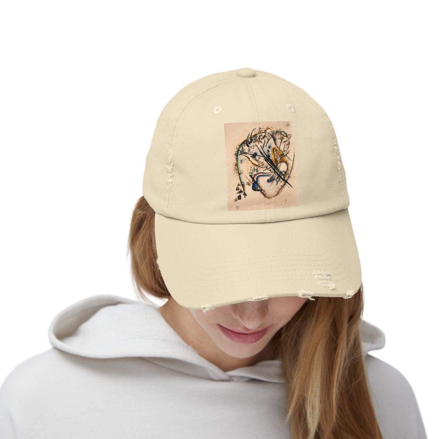 a woman wearing a hat with a picture of a dragon on it