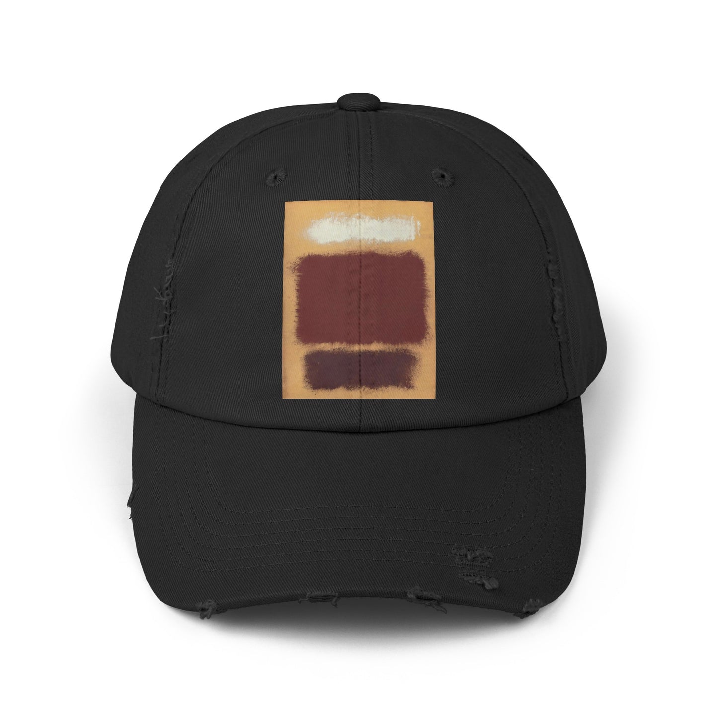 a black hat with a brown and white painting on it