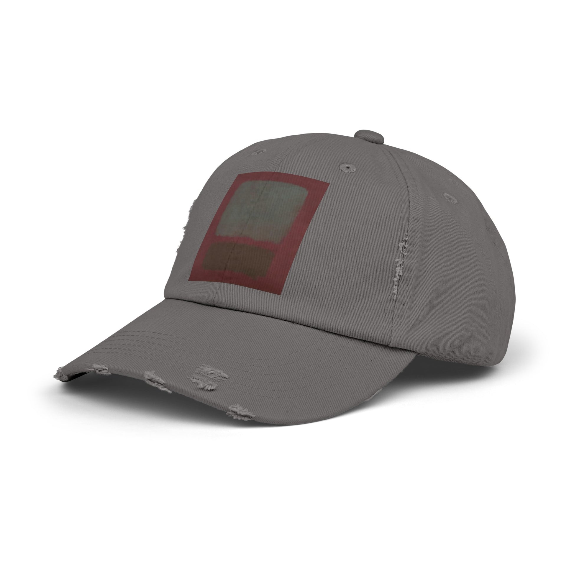 a grey hat with a red patch on the front