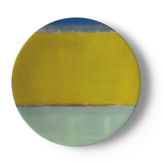 a plate with a yellow and blue design on it