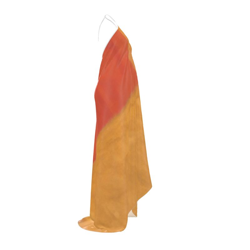 an orange and yellow dress hanging on a white hanger