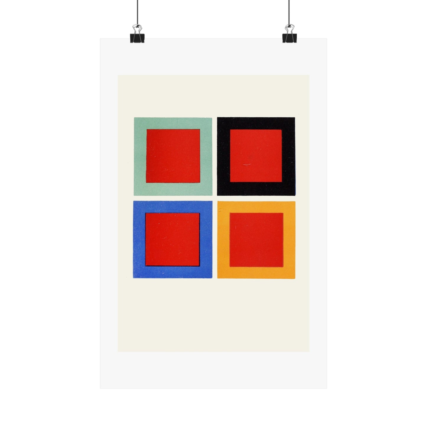 a white poster with four squares in different colors