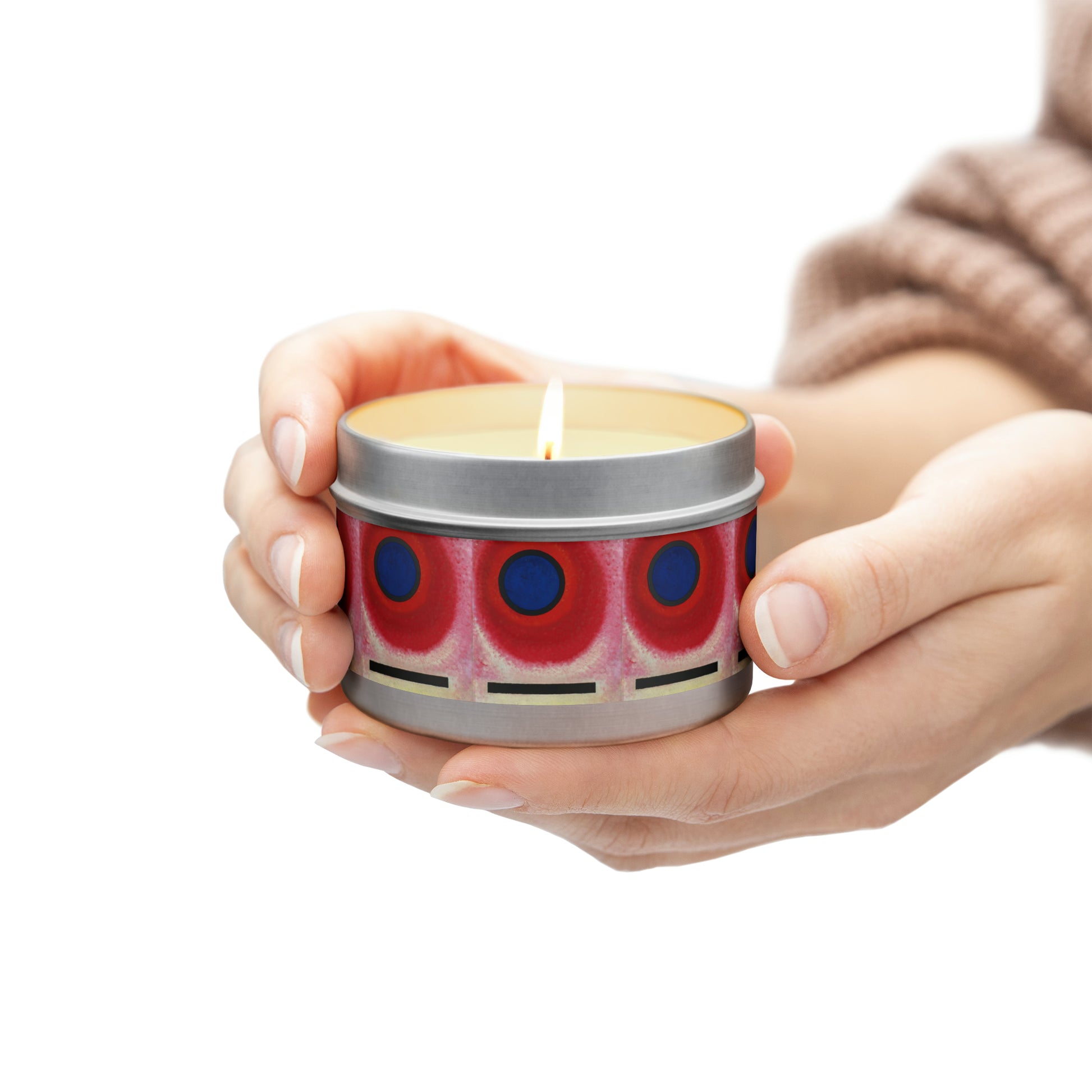 a woman holding a candle in her hands