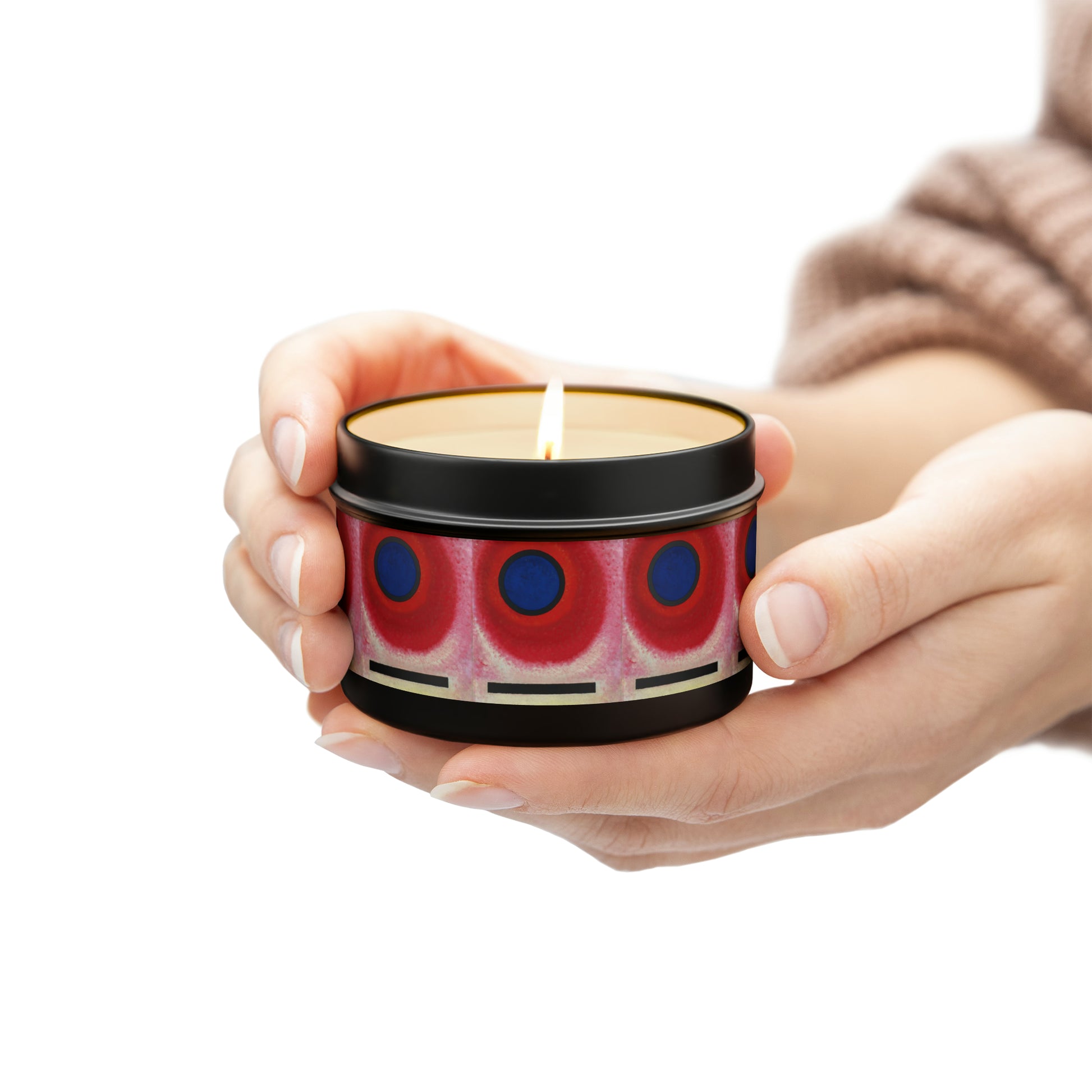 a woman holding a candle in her hands