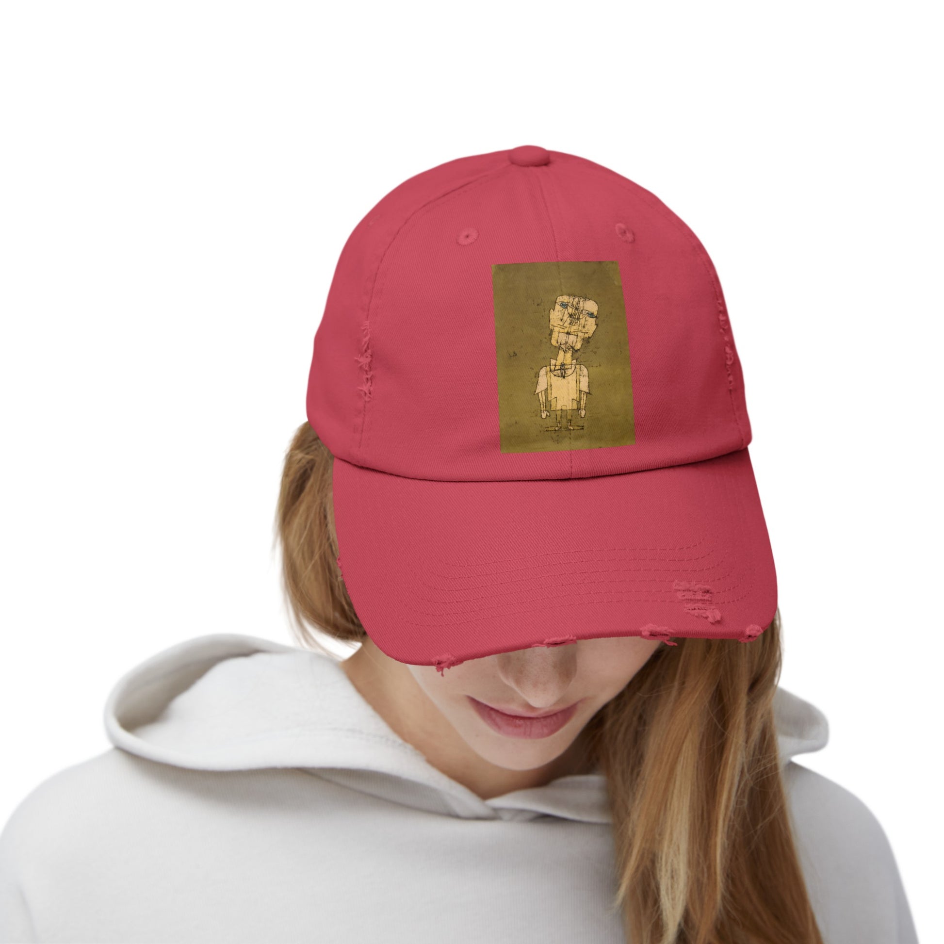 a woman wearing a red hat with a picture of a man on it