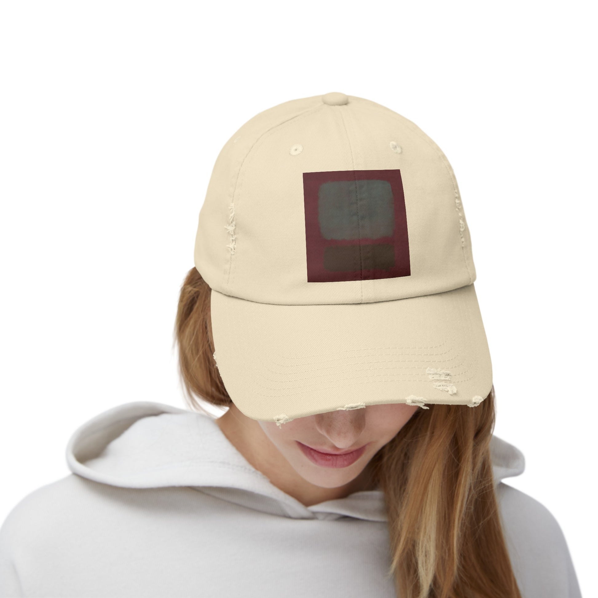 a woman wearing a hat with a picture on it