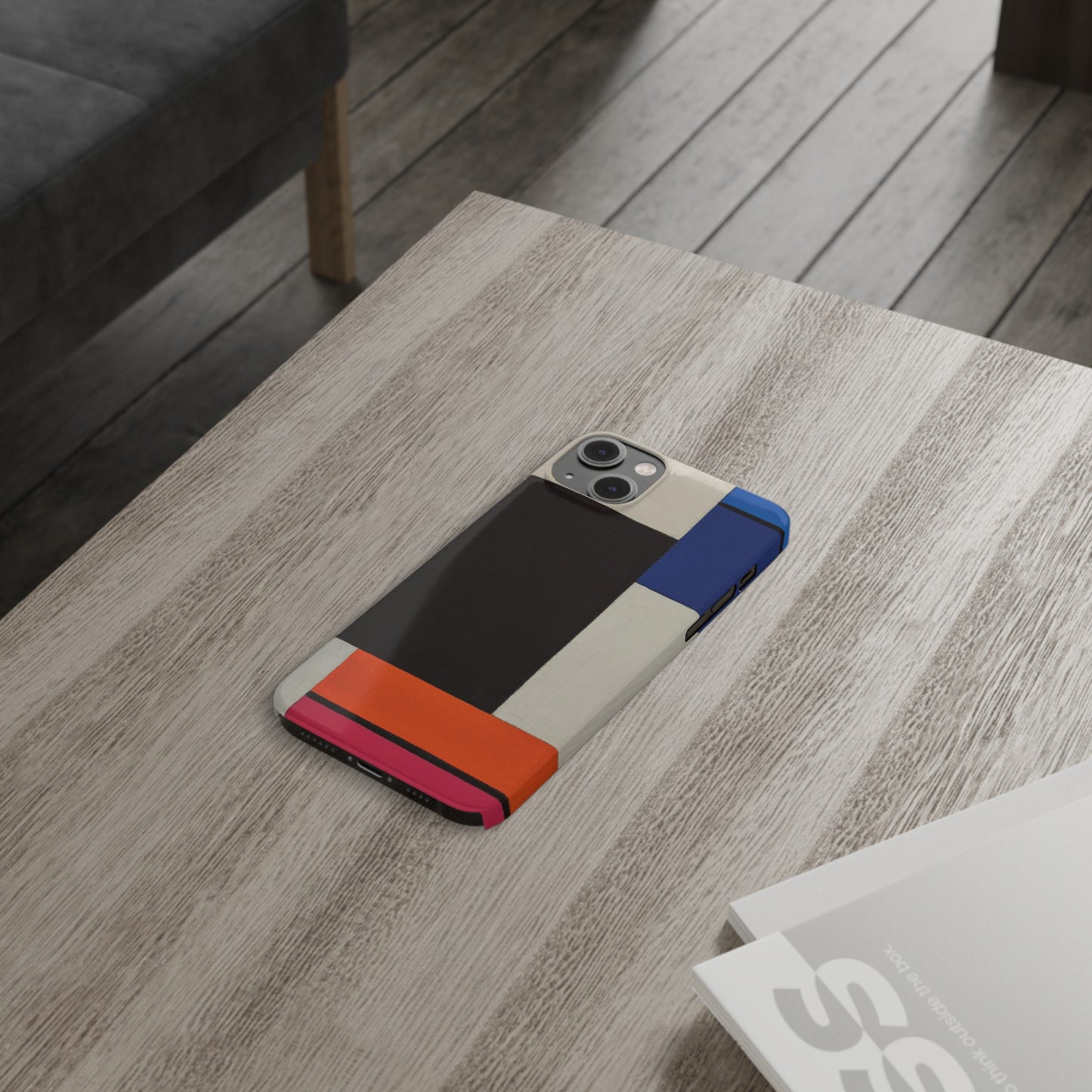 a phone case sitting on top of a wooden table