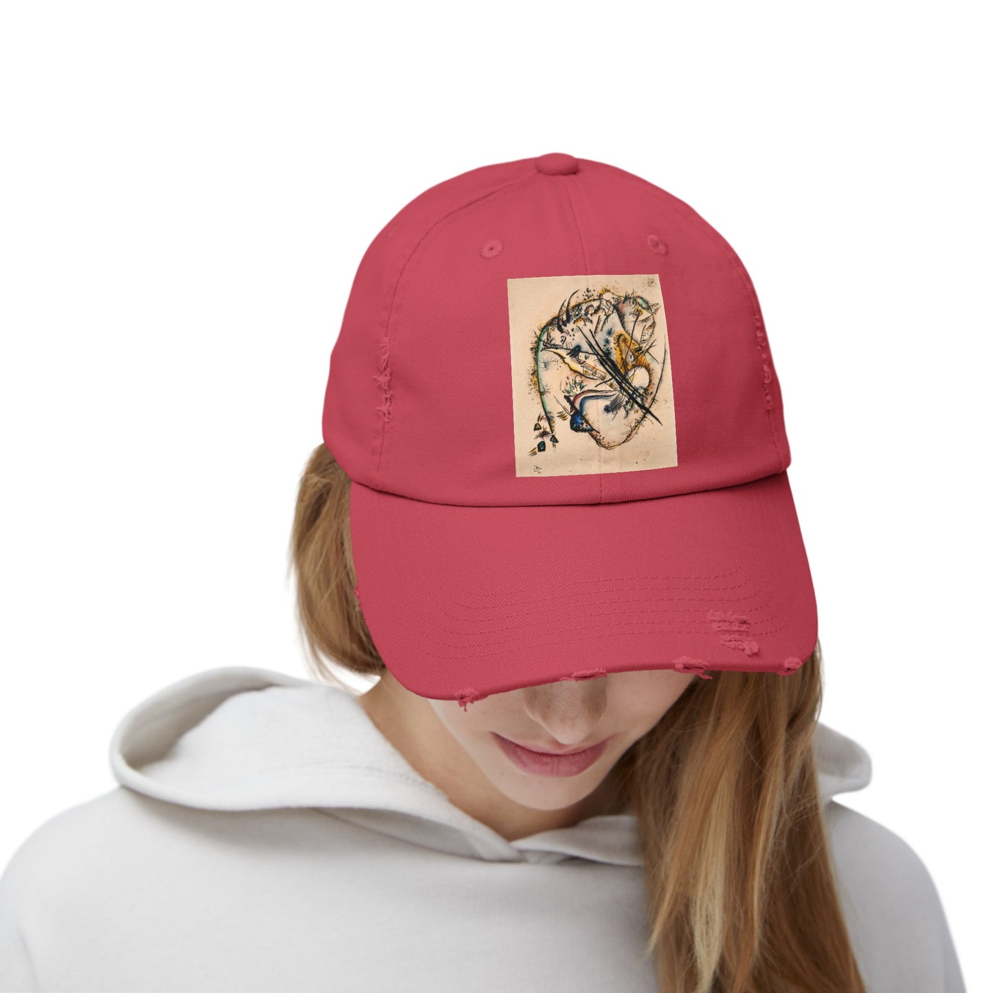 a woman wearing a red hat with a picture of a dragon on it