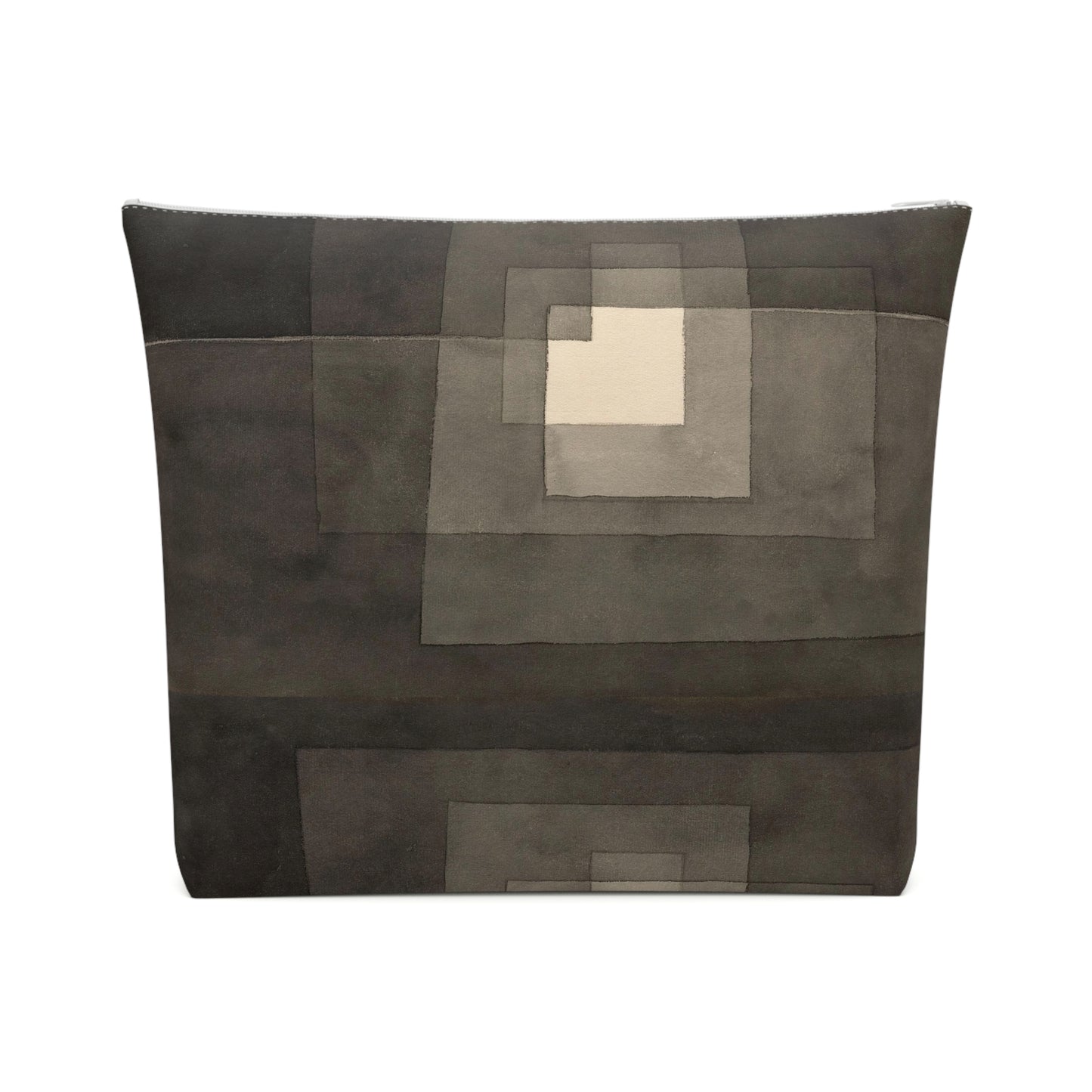 a black and white pillow with a square in the middle