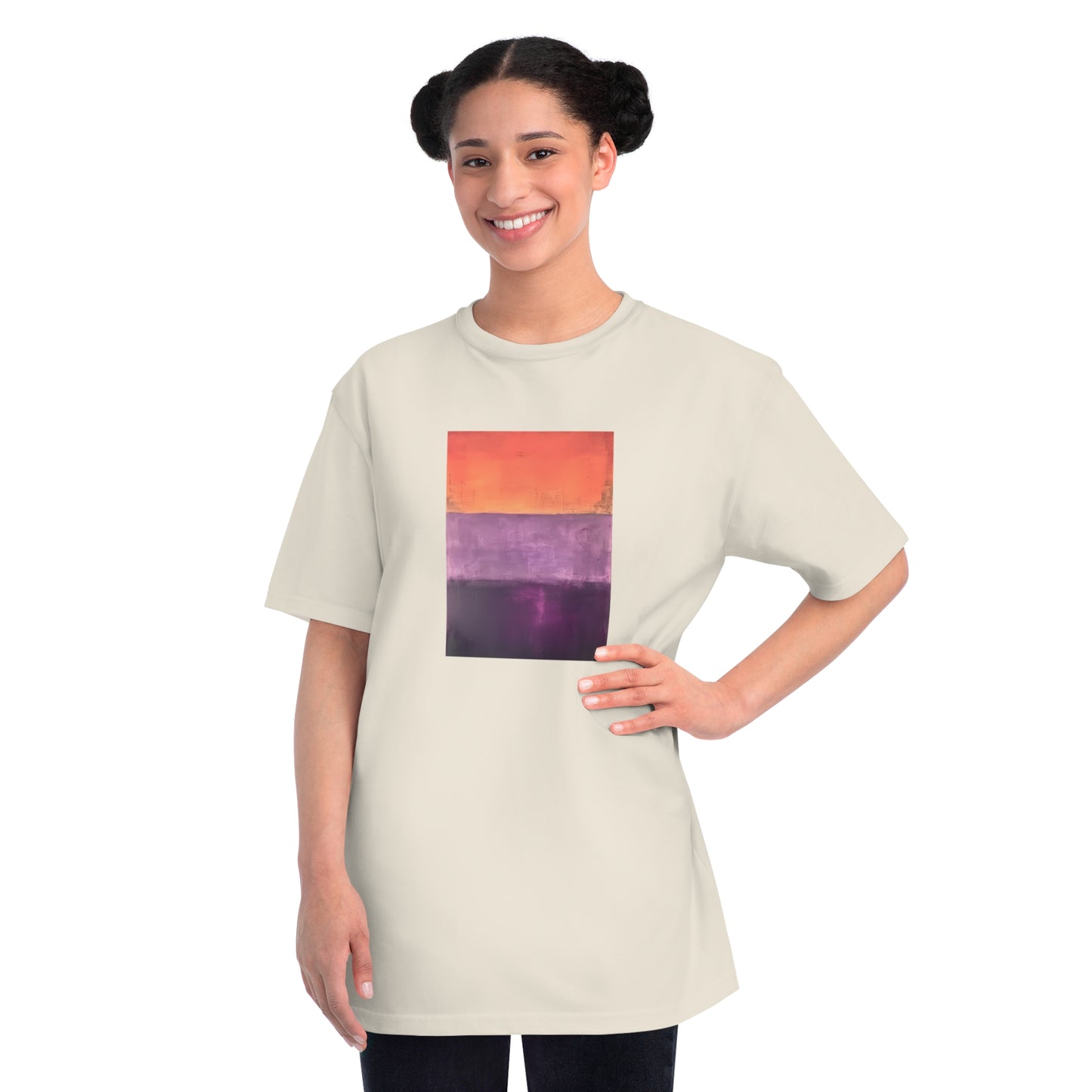 a woman wearing a t - shirt with a picture of a sunset
