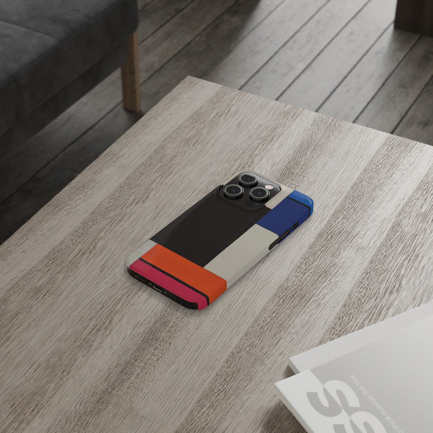 a phone case sitting on top of a wooden table