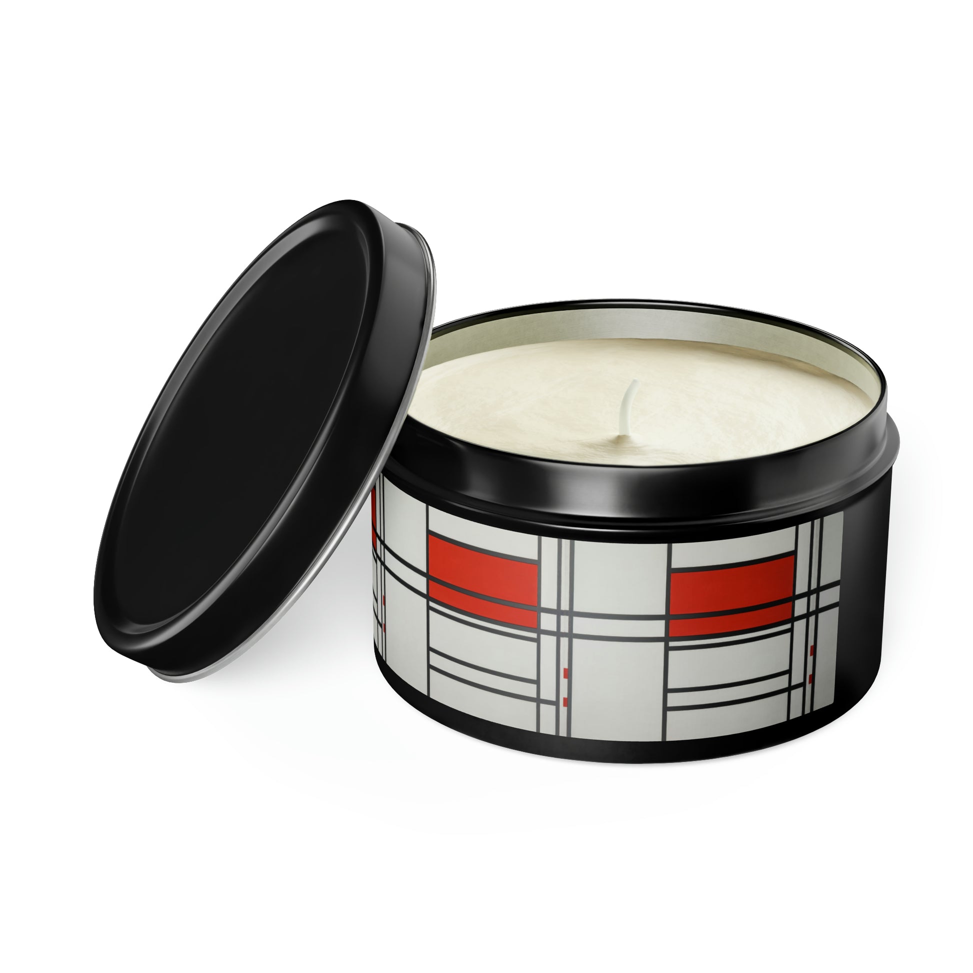 a candle in a tin with a lid