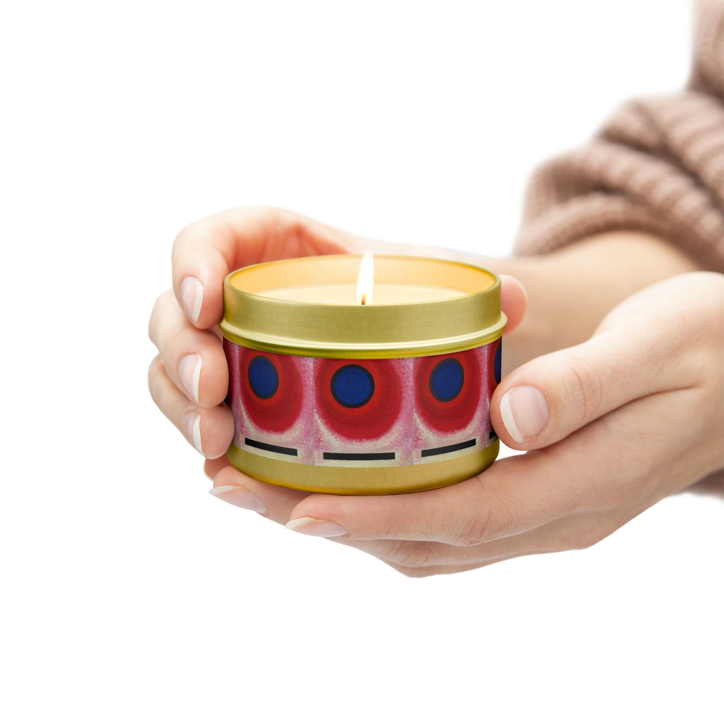 a woman holding a candle in her hands