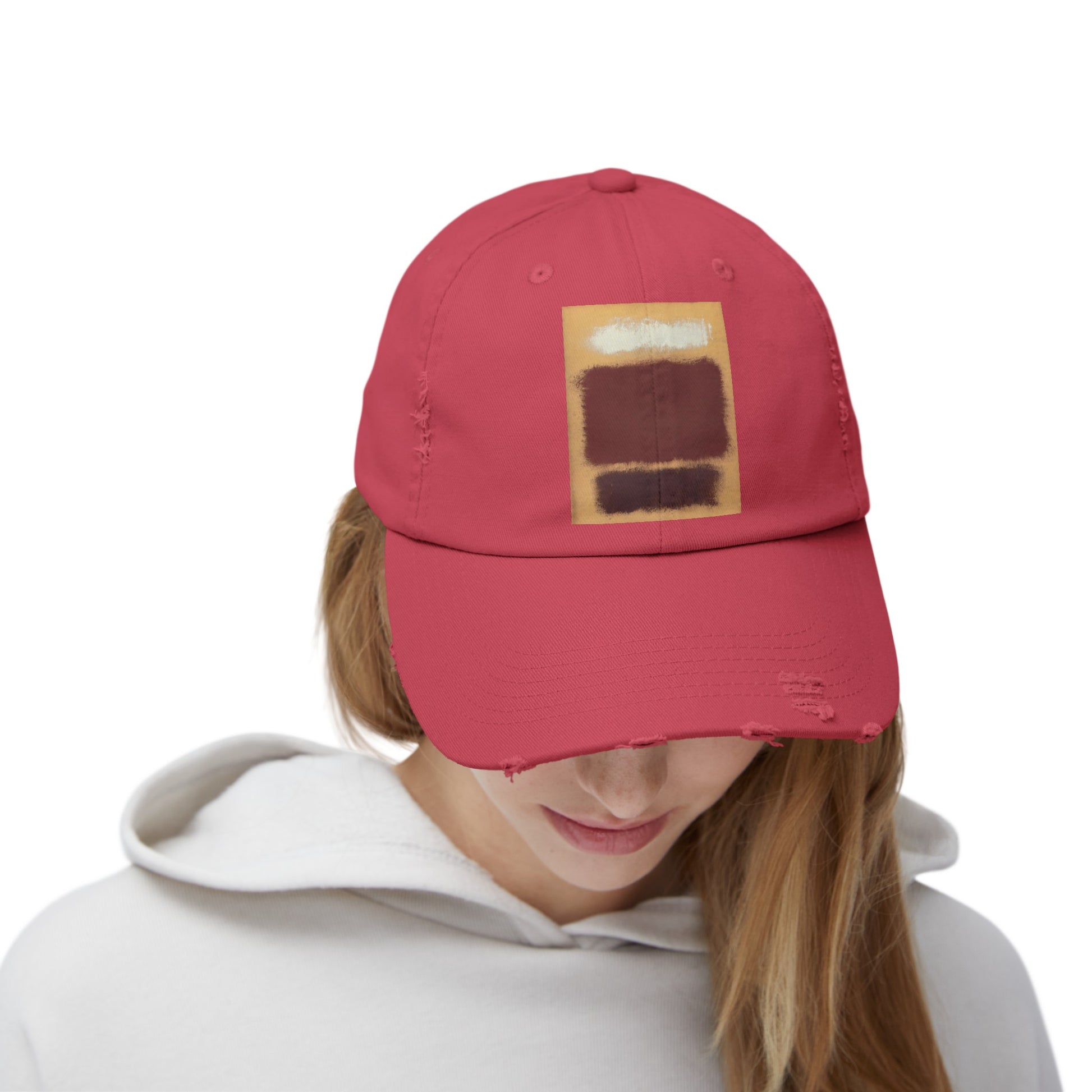 a woman wearing a red hat with a piece of bread on it